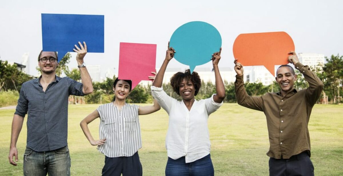 People holding speech bubbles