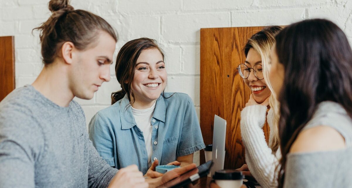 People in a group laughing