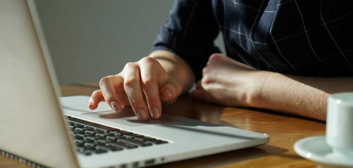 Person typing on a laptop