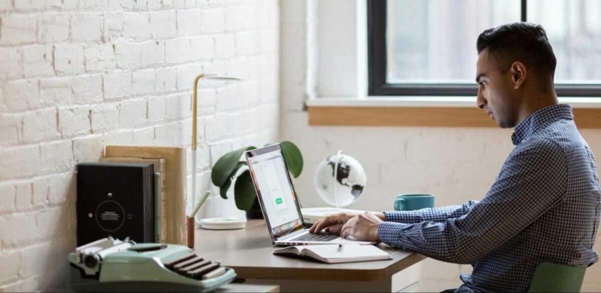 Man sitting on computer