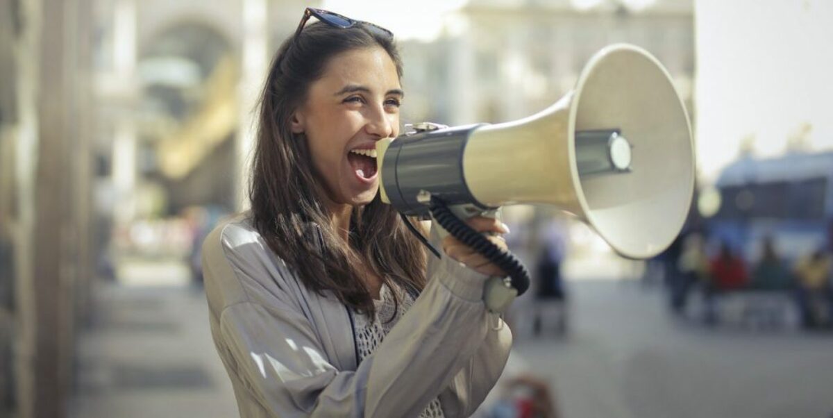 Woman using megaphone