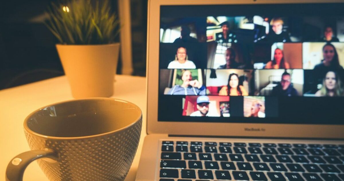 Taking an evening Zoom call teleconference meeting. Needed a cup of coffee to stay up late to check in with my co workers.