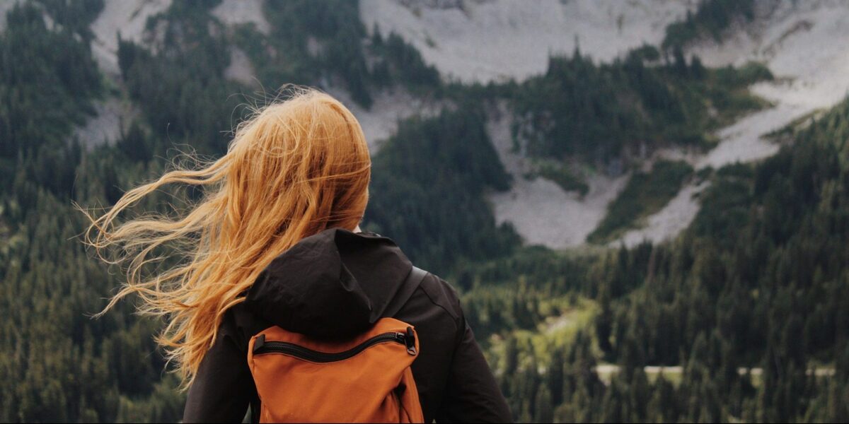 woman seeing mountain during daytime