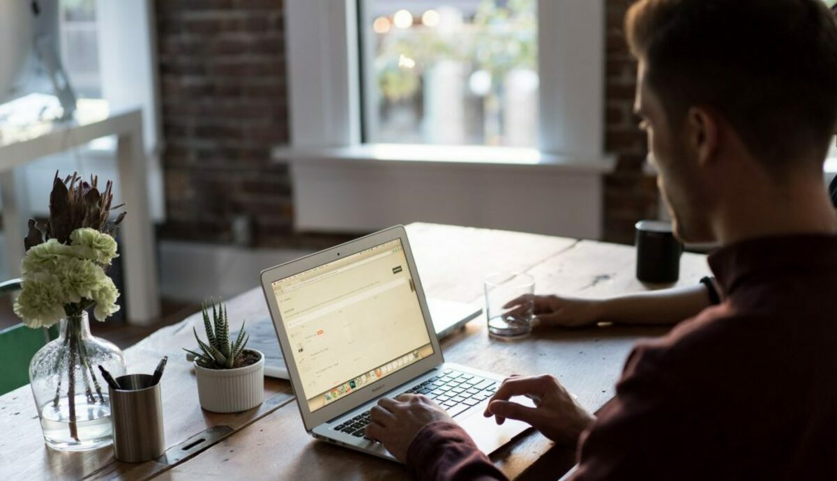 Man at a laptop in an office