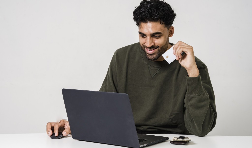 Man holding his credit card
