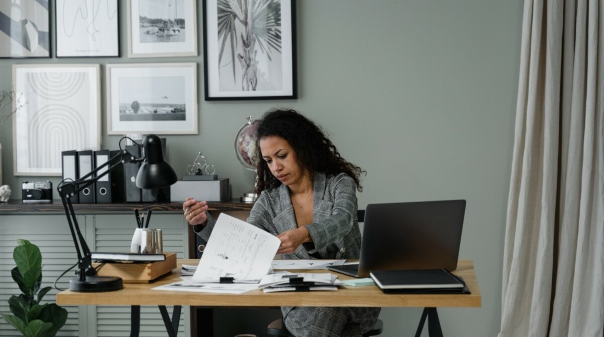 Woman Going Through Papers