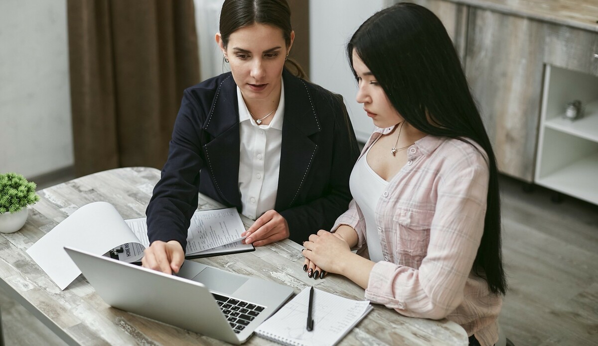 Women looking at a laptop together