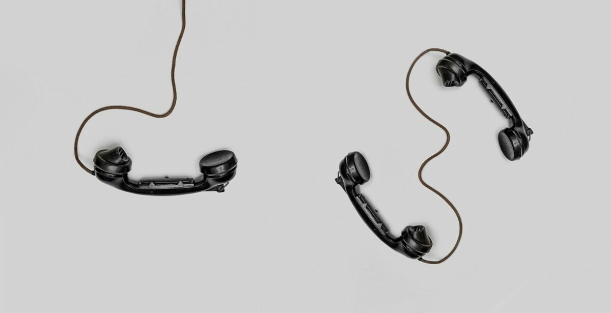 Three black handset toys