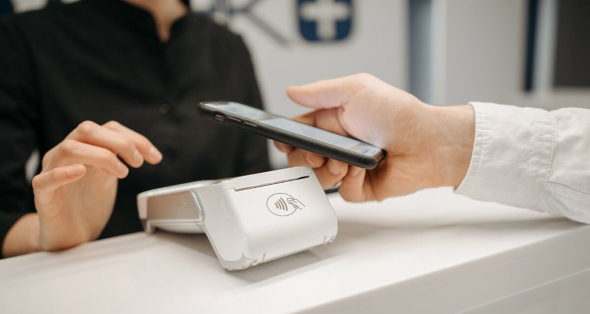 A person making payment using smartphone